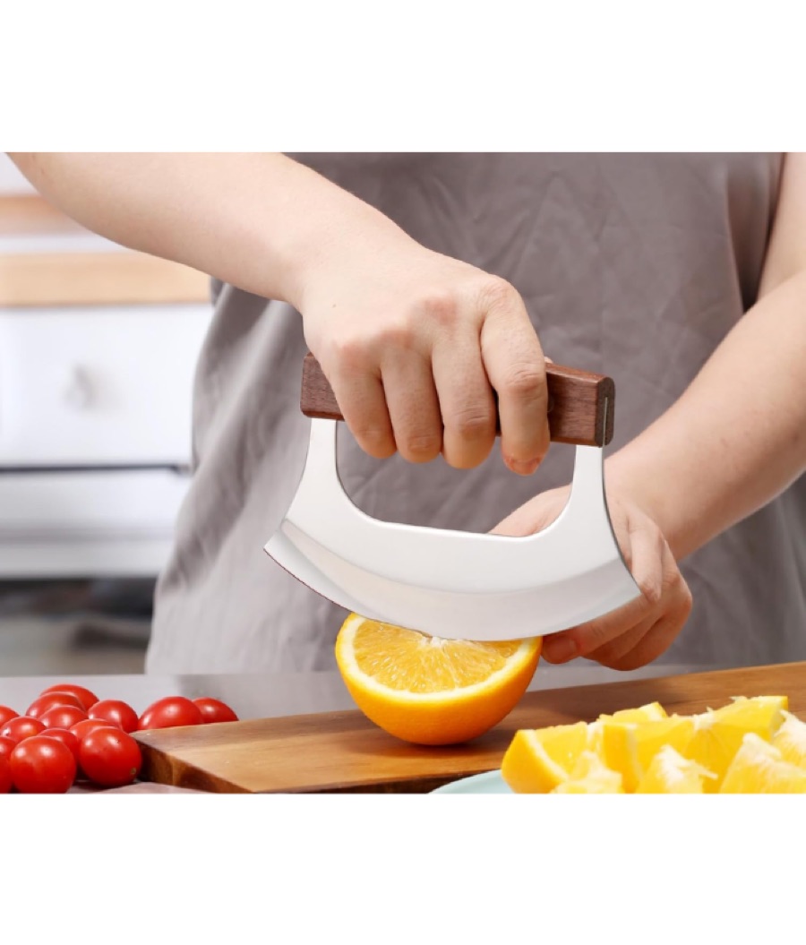 Adaptive kitchen tools laid out on a counter, including easy-grip utensils and an opener.