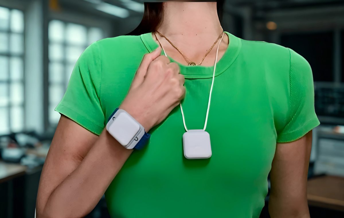 A study participant wearing a small white activity sensor on the wrist and a second sensor on a lanyard at the chest, capturing movement data during a pilot study.