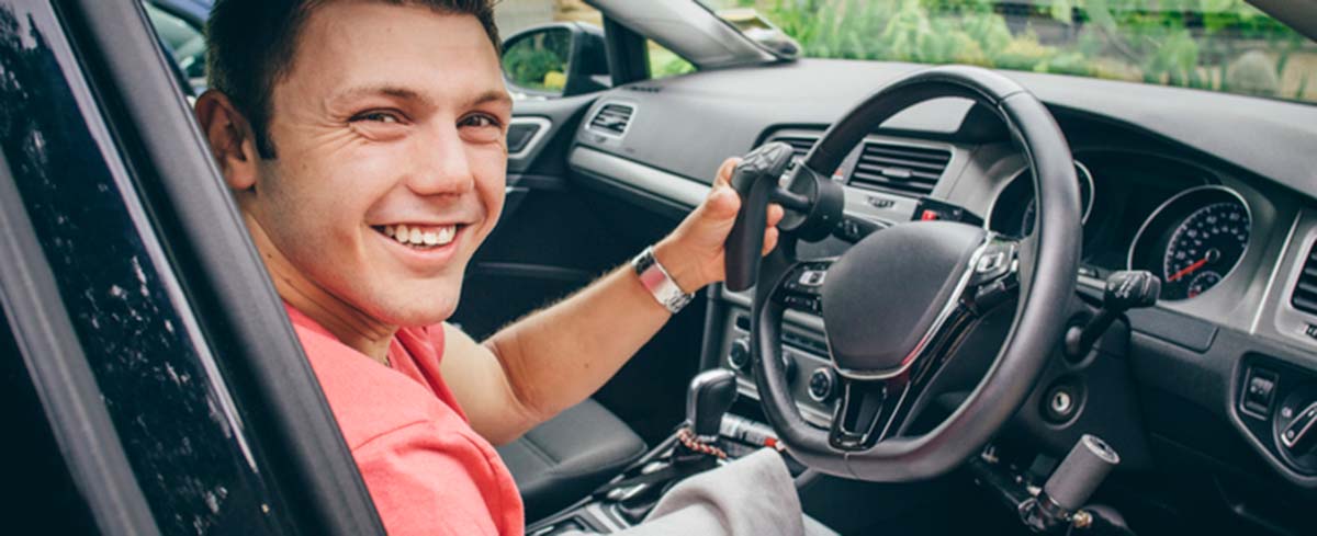 A person driving a car.
